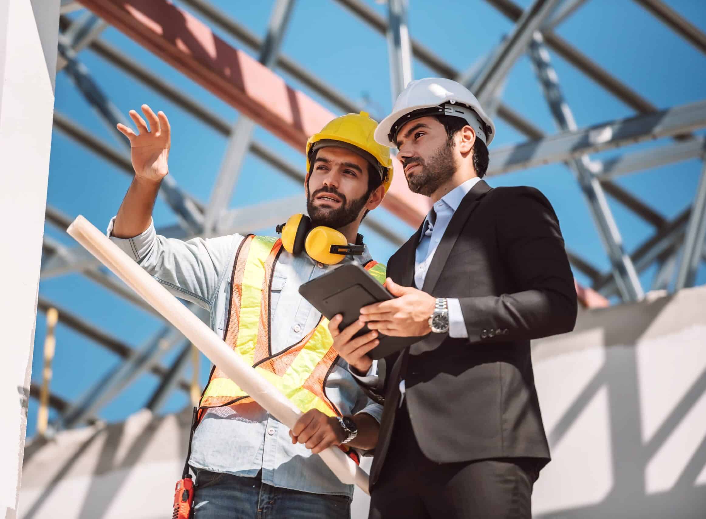 business man and construction worker in conversation