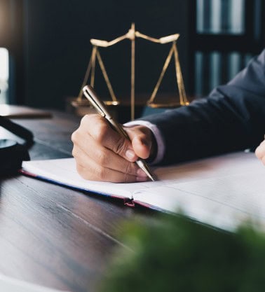 Businessman signing a document